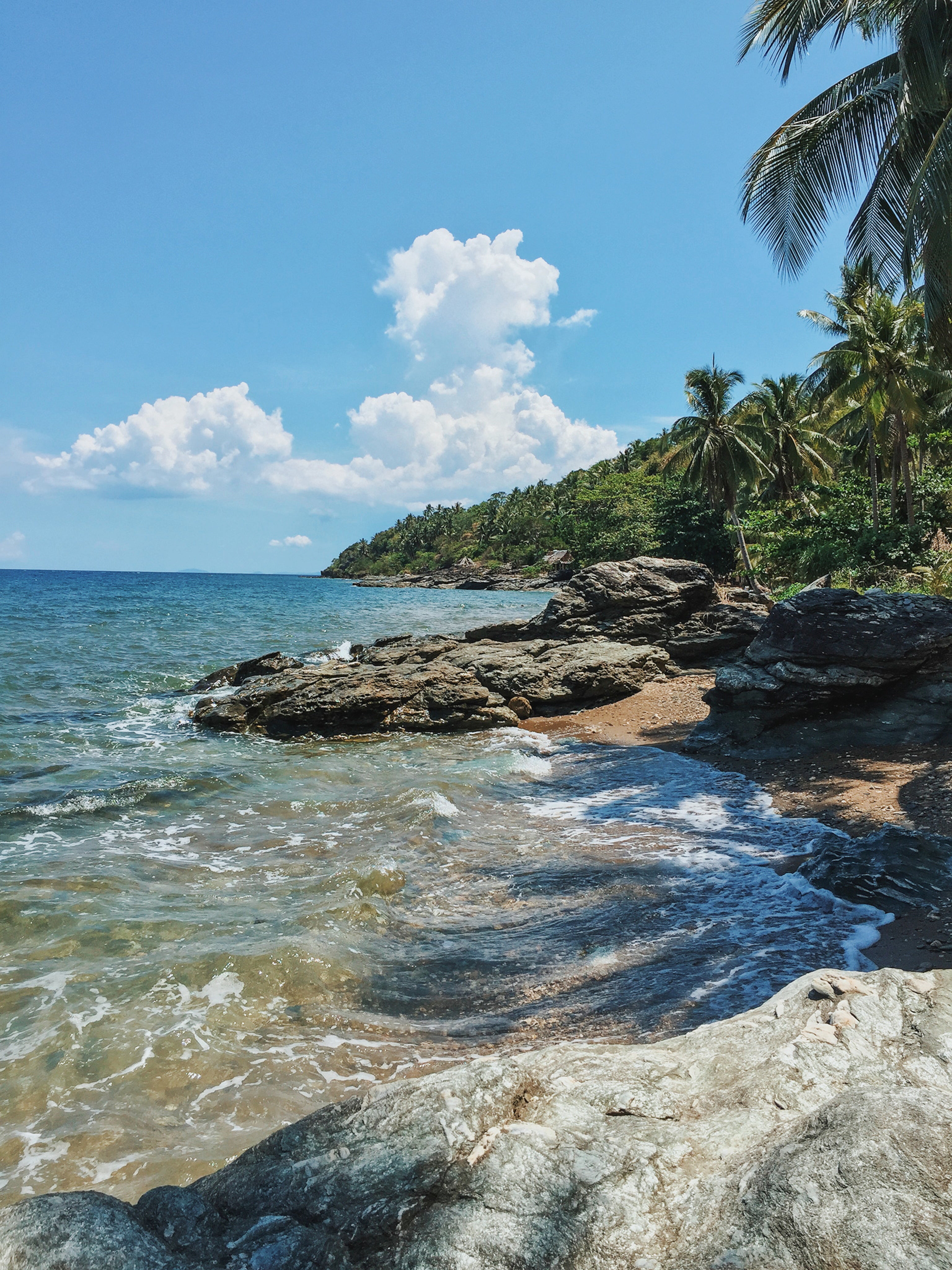 water-crashes-at-rocky-island-shore.jpg